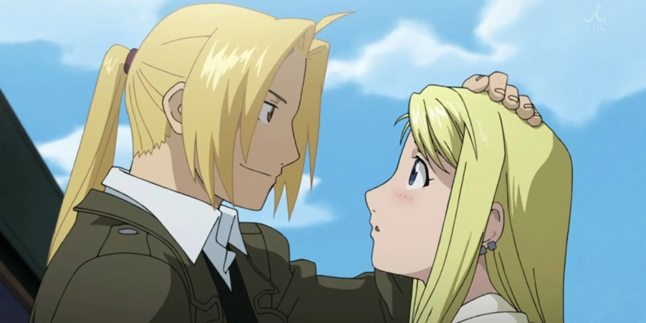 Anh em Edward và Alphonse Elric đoàn tụ với Winry Rockbell trong cái kết của Fullmetal Alchemist Brotherhood