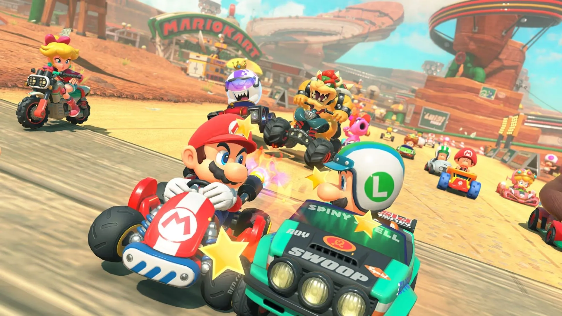 Góc nhìn từ phía sau xe đua trong Mario Kart World, tập trung vào chi tiết đường đua và hiệu ứng hình ảnh.