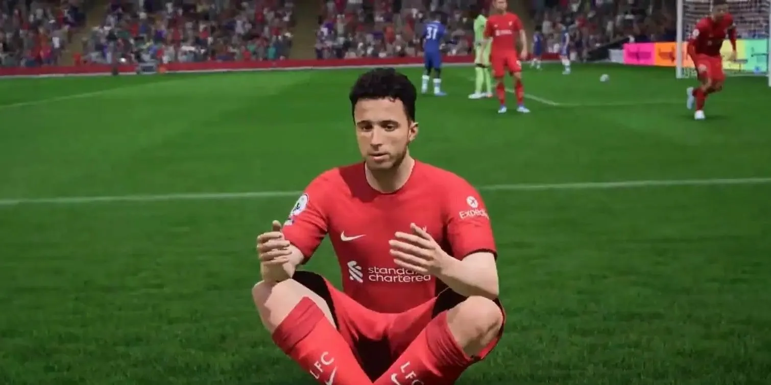 Diogo Jota ăn mừng bàn thắng với hành động đặc trưng trong FIFA 23, biểu tượng của sự chân thực trong EA FC.