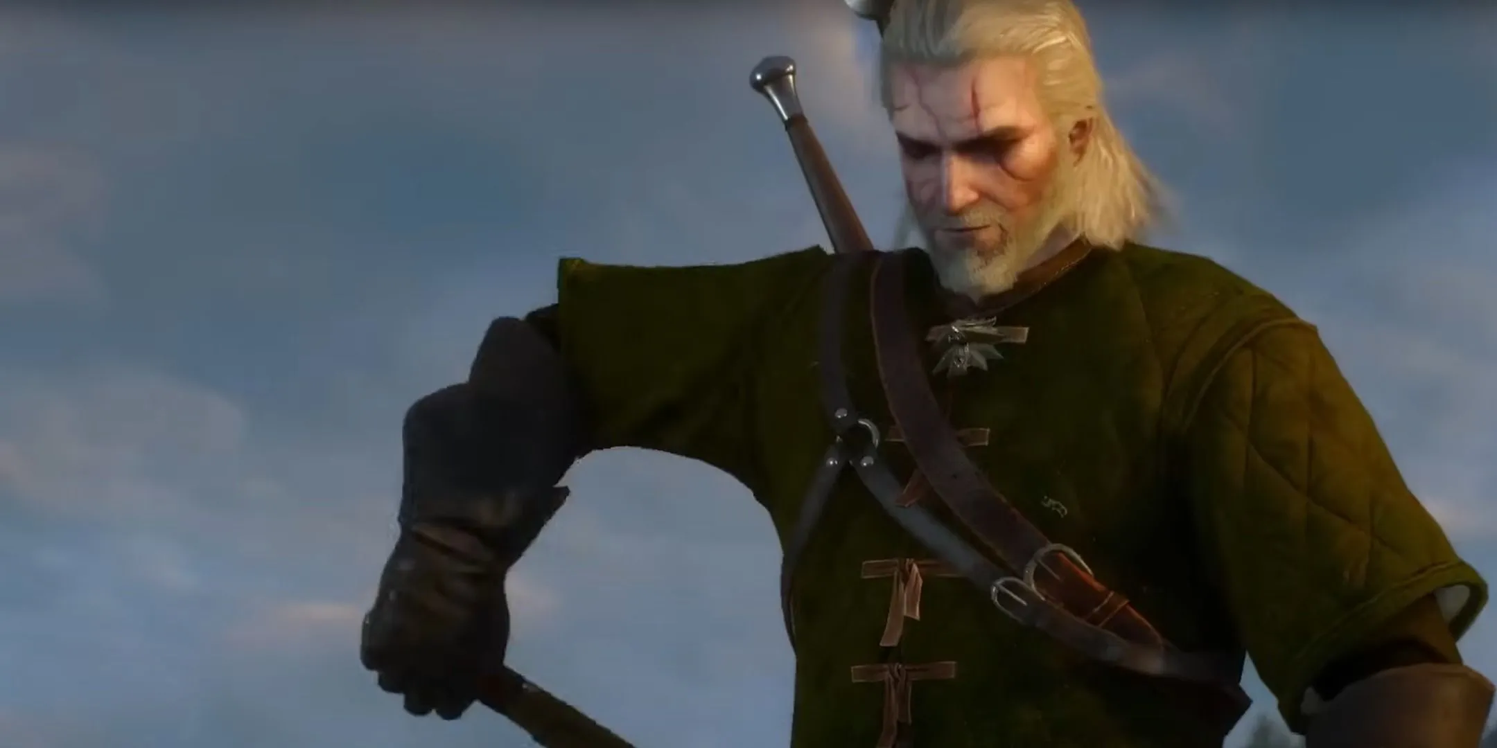 Geralt cầm đầu griffin trong The Witcher 3: Wild Hunt, minh họa việc anh ta thường xuyên giải quyết các vấn đề nguy hiểm cho người khác.