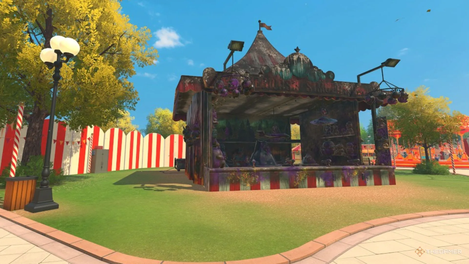 Gian hàng bắn súng lộn xộn và lều bẩn giữa công viên chờ được powerwash